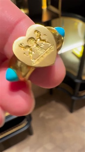 FD GALLERY on Instagram: "Antique Turquoise And Gold Signet Ring, Designed as a heart shaped head featuring a crest with rampant lions and a bundle of wheat to the wide band set with 3 turquoise oval shaped cabochons, inside of the band inscribed ‘cor unum, via una, October 14th 1877′, circa 1877 Size/Dimensions: US ring size 5 1/2 Marked: B&H18CT Gross Weight: 30.7 grams REF No. RNG-8928"