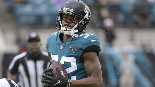 Tyson Campbell steps in front of the pass from Mills for key interception