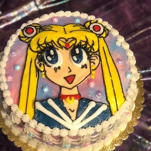 39 reactions | Sailor Moon Cake!   Pandan cake with vanilla custard filling and cream cheese frosting (all vegan of course) used @miyokos_kitchen cream cheese, it was so good. Also @wiltoncakes jewel sprinkles on the sides :) #vegan #cakes #cakedecorating #vegansofig #veganfood #cake #cakesofinstagram #ashleyshotwell #pandan #vegancreamcheese | Ashley Shotwell Cakes | Facebook