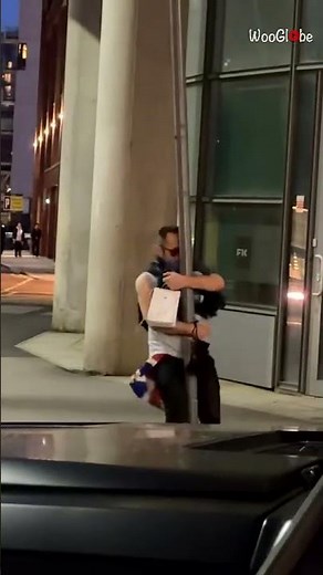 Street Scene: Man's Unusual Encounter with a Pole in Manchester || WooGlobe