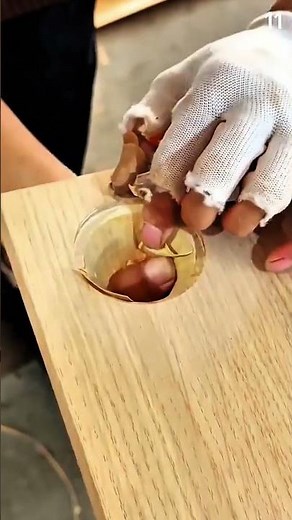 Installing brass cup insert into sanded wood surface