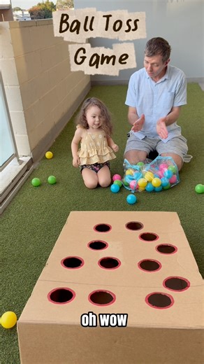 Ball Toss Game. Turn a cardboard box into a fun ball game 🏀 Let your child roll the ball to aim at the holes. This is perfect for hand-eye coordination, active play indoors or outdoor. Turning everyday items into learning games kids love. This activity is worth a try. Hours of fun and giggles. You only need: ✅cardboard box Balls Cutter (to cut for hole) #learningisfun #diyactivitiesforkids #toddleractivities #learningthroughplay | Juliefel Geraldez Flew