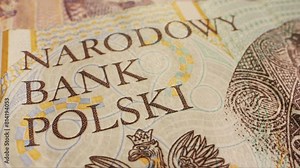 Detailed showcase of Polish banknotes with rooster and Narodowy Bank Polski