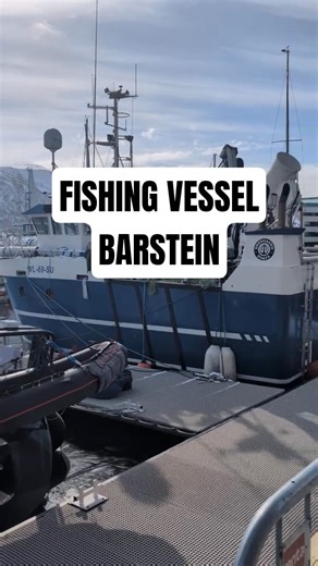 Fishing Boat and Sailboats in the harbor of Tromso
