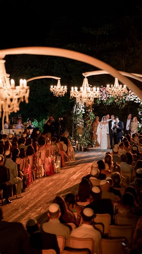A Jewish wedding night at @nizucresort where the chuppah feels like a...