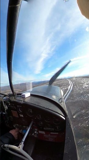 Cessna 170B Landing on Snowy Ridge