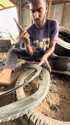 Watch the tire being cut and split into two parts.