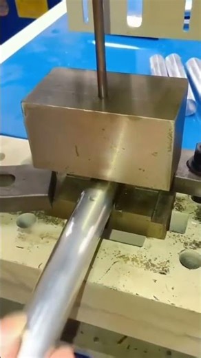 Semi-automatic feeding single station hydraulic pipe punching machine, made in China.