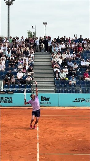 Arthur Rinderknech banging a serve down to take the game at the Mutua Madrid Open