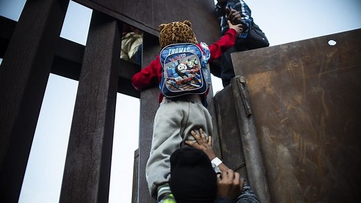 Behind the wall: How thousands of asylum seekers are trapped at the U.S. border