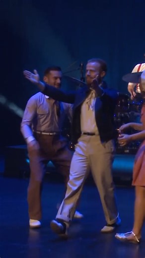 Dancers are switching partners during song