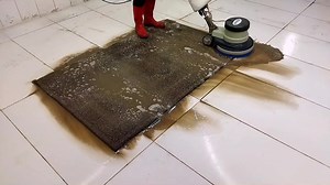 Efficient Tiled Floor Cleaning with a Rotating Brush Machine