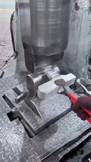 Powerful Metal Forging Process: Hydraulic Press Shaping Steel with Extreme Force Precision