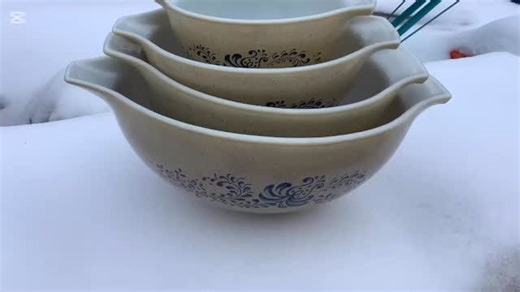 Pyrex came out with the Homestead pattern in 1976 to go with the country living trend of the time. It has a beige base with brown speckles just like the Forest Fancies (mushroom pattern). They made Brown Homestead and Blue Homestead which was the colour of the applied folk art, a stipple-style viney floral pattern. It fits in perfectly with the cottage-core trend of today. Finding a complete set in very good condition is not easy. Complete sets usually sell between $160-250. X4 Blue Homestead ci