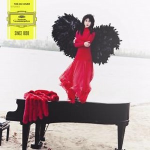 3K views · 95 reactions | A grand piano on a beach. A raven-haired angel with huge black wings and a fiery red dress. Yuja Wang loves the unexpected and unconventional. Dive into our first June installment of The DG Cover Stories Exhibition to find out how this cover came to be  dg-125.com | Deutsche Grammophon - DG | Facebook