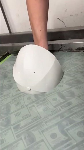 Hydro dipping dollar pattern process of a baseball cap