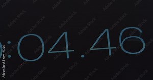 Close up of the timer counting seconds and milliseconds on the black screen. Macro