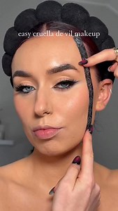 easy cruella de vil makeup 🖤 PRODUCTS @nudestix tinted cover foundation @morphebrushes eyeshadow @yslbeauty lipstick @mehronmakeup @mehronuk clown white paint @sculptedbyaimee liquid lights bronzer @bobbibrownuk face base @lorealparis superliner @maybelline sky high mascara @hudabeauty easy bake powder #halloween #halloweenmakeup #tapemakeup #tapemakeupchallenge #cruelladevil #cruelladevilmakeup #cruelladevilcosplay #cosplay #halloweencostume #halloweeninspo #101dalmatians #101dalmationscosplay