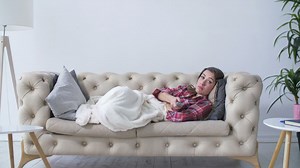 Woman lying on a sofa - Free Stock Video