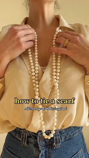 Do you have a long pearl string that you have no idea how to style? Here is my suggestion with the help of a long scarf 🤍 Save this for future inspo! #oldmoney #oldmoneyaesthetic #oldmoneyoutfits #howto #scarftutorial #outfitideas #elevateyourstyle #frenchstyle #parisianstyle #fypシ #pearlnecklace
