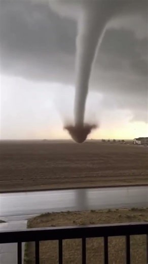 Tornado Funnel Rapid Formation from Balcony