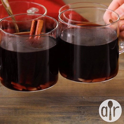 "Glogg is warm served during the Christmas holidays in Sweden and other Scandinavian countries, as it is sweet, spicy, and warming. This is the adult version of the drink, so don't serve it to the kids! Garnish drinks with raisins and slivered almonds. Serve warm with gingerbread cookies." GET THE RECIPE for Swedish Christmas Glogg: https://trib.al/xAK1JqU | Allrecipes