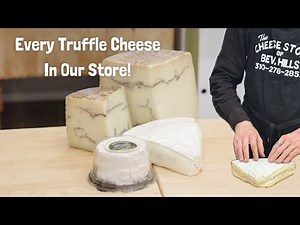 Cheesemonger Cuts Truffle Cheese at The Cheese Store of Beverly Hills