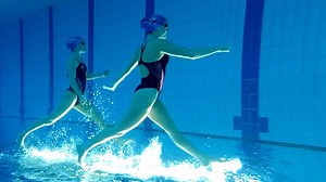 Synchronised swimmers 'dance in the water'