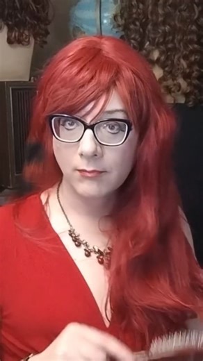 Inconstant Avatar on Instagram: "From the Fire Session ASMR wig brushing video, this is a part with only the red wig being brushed while worn, with another red wig beneath it. This video has no talking. Only light brushing sounds. #wigs #genderqueer #hairbrushing #queer #drag"