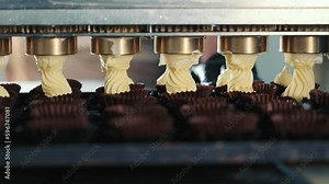 Candy Production Line At The Factory. Making Sweets From Cream Automatically.