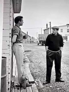 Johnny Cash having a chat with his local tour guide . 1961 Pic. to A .I Vid . Newfoundland