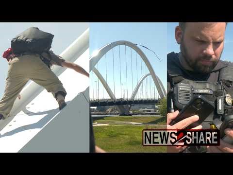 Protester scales bridge in DC, plans to stay for days against Iran War, AI development