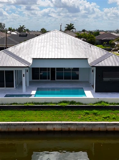 🌟Experience the ultimate Florida lifestyle in this NEW CONSTRUCTION Custom-Built Home located in the fast-growing Northwest Cape Coral area. 👉Featuring 3 Bedrooms a Den, 3 Full Bathrooms, and a spacious 3-Car Garage - - this 2,869 sq. ft. home is designed for both luxurious living and everyday functionality. 🌴Thoughtfully constructed with Energy-Efficient ICF (Insulated Concrete Form) walls and a sleek Metal Roof, this brand-new home offers lasting durability, modern style, and exceptional co
