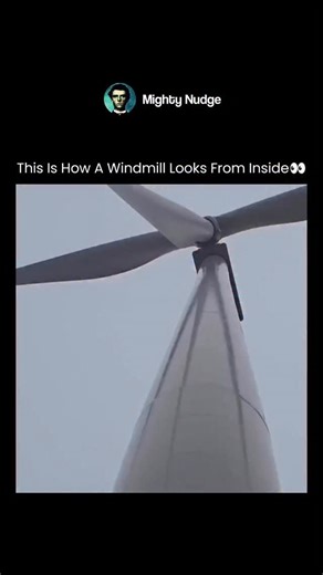 MIGHTY on Instagram: "Inside a windmill, the world feels completely different from the graceful silhouette we see turning slowly on the horizon. The moment you step in, you realize you’re standing inside a giant, living machine. A narrow ladder or spiral staircase leads upward through a tall, hollow tower, the sound of humming machinery and rushing air echoing softly as you climb. The walls are smooth, cool, and perfectly curved, almost like the inside of a massive metal shell. At the very top, 