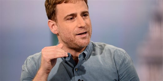 Slack cofounder says workers and CEOs can get stuck doing 'fake' work like pre-meetings and slide shows | Fortune