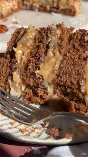 The Best Homemade German Chocolate Cake Layers of rich chocolate cake, creamy coconut-pecan filling, and silky chocolate buttercream Yield: One 2-layer 8" or 9" cake (12 servings) Prep time: 30 minutes Bake time: 25–35 minutes Cool & assemble: 2 hours 📝 Ingredients Chocolate Cake 2 cups (400g) granulated sugar 1¾ cups (210g) all-purpose flour ¾ cup (75g) unsweetened cocoa powder (natural or Dutch-process) 1½ tsp baking powder 1½ tsp baking soda 1 tsp salt 2 large eggs, room temperature 1 cup (2