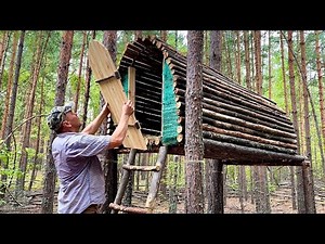 Building an unusual above ground hut | Summer log cabin for survival