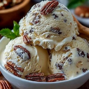 Homemade Butter Pecan Ice Cream Recipe 🥜 Ingredients: - 2 cups heavy cream - 1 cup whole milk - 3/4 cup granulated sugar - 4 large egg yolks - 1 cup chopped pecans - 2 tablespoons unsalted butter - 1 teaspoon vanilla extract - 1/4 teaspoon salt Directions: 1. In a skillet over medium heat, melt the butter and add the chopped pecans. Toast them for 4-5 minutes until fragrant, then remove from heat and let cool completely. 2. In a medium saucepan, combine the heavy cream, whole milk, sugar, and s