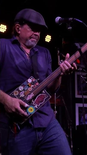 Playing the first cigar box guitar we made, recorded at The Funky Biscuit in July 2024 by Datflys