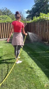 woman watering lawn, lawn grass, yard work, material for landscaping, gardening, landscape