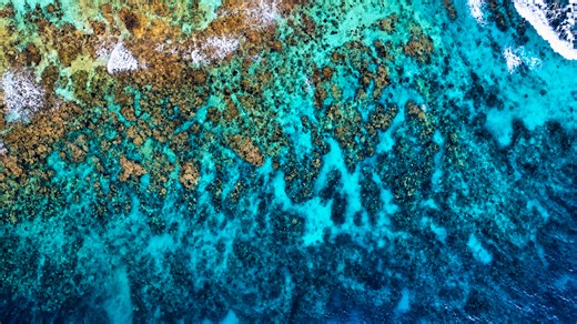 Tropical reef patterns seen from high above the ocean
