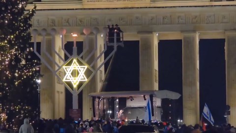 Germany: Pro-Israel community gathers at Brandenburg Gate on Hanukkah following Sydney attack 2