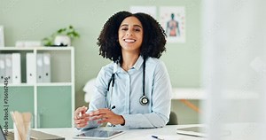 Black woman, face and technology on desk for doctor appointments or online schedule, patient charts and medical apps. Female healthcare specialist, happy and digital health records with tablet.