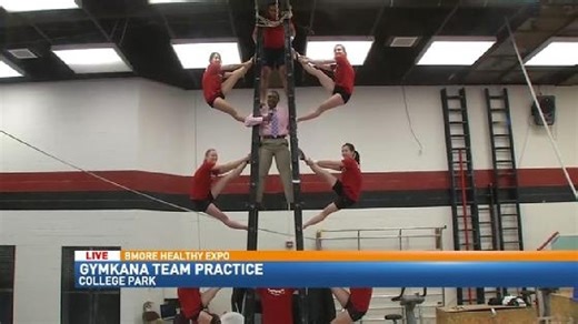 Larry Collins 'Hangs Out' With Gymkana Gymnastics Team