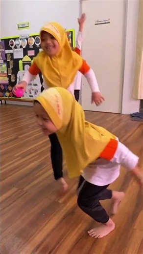 Physical Development: Hand eye coordination by cathing ball activity