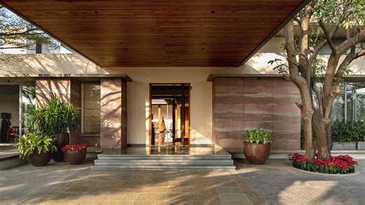Rammed-earth walls enclose A House Born of Four Soils in India