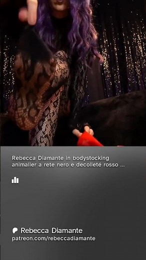 Rebecca Diamante in a black animal-print fishnet bodystocking and red leather décolleté #goddess