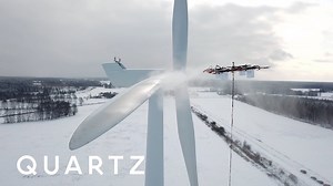 De-Icing Industrial Wind Turbine Blades with Giant Drones