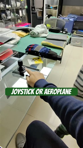 My Son saw CCTV Joystick & got interested in using it, to feel like he is operating an aeroplane.