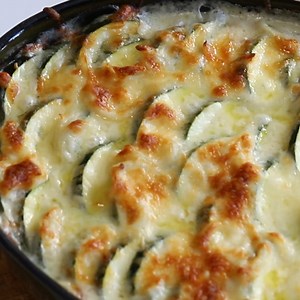 This zucchini casserole is low-carb side dish made with layered sliced zucchini and a creamy parmesan cheese sauce. Recipe >> https://www.lowcarbspark.com/zucchini-casserole/ | Low Carb Spark